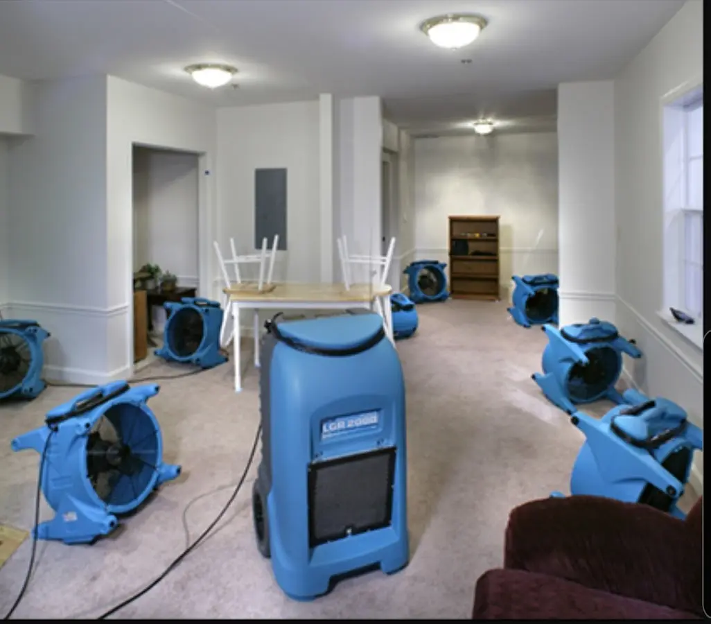 Air movers and dehumidifier setup for Water Damage Restoration in Morganton